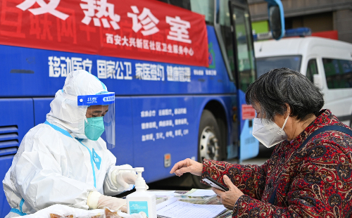 China downgrades COVID management