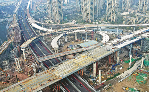 Road construction for Asian Games in full swing